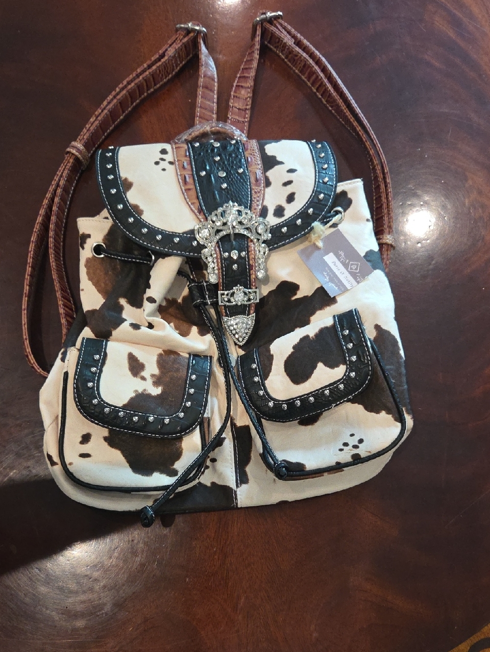 Cowhide-Pattern Studded Backpack with Western Buckle - Brown & Cream